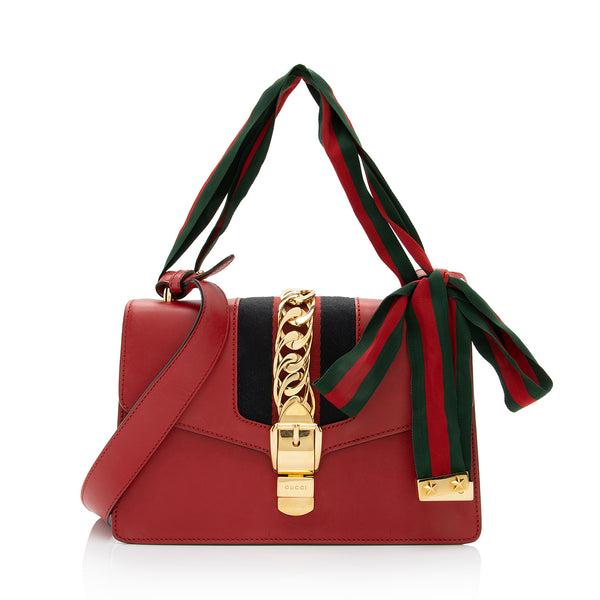 red gucci bag with gold chain