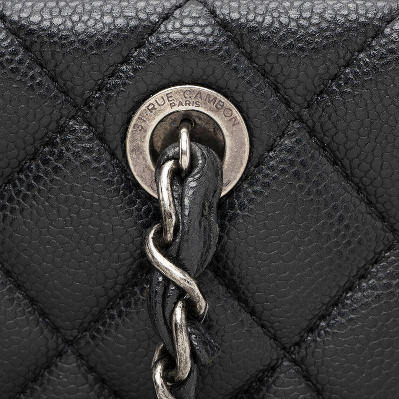 Chanel Caviar Leather Fold In Flap Top Tote (SHF-yvfNuJ)