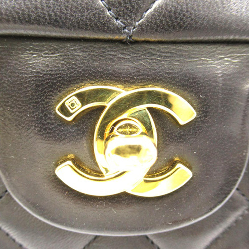 Chanel Medium Classic Lambskin Double Flap (SHG-tJEubT)