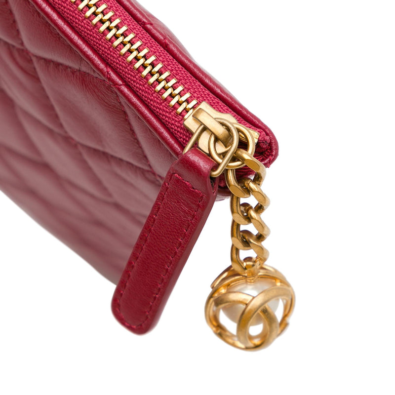 Chanel Medium Quilted Lambskin O Case Clutch (SHG-wDy0Mj)