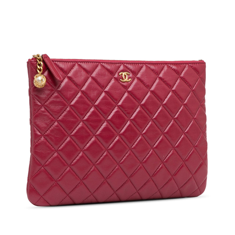 Chanel Medium Quilted Lambskin O Case Clutch (SHG-wDy0Mj)