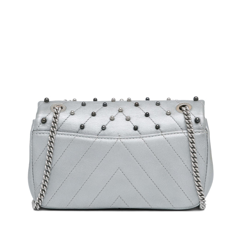 Chanel Mini Rectangular Chevron Quilted Lambskin Stud Wars Flap (SHG-17y5S9)