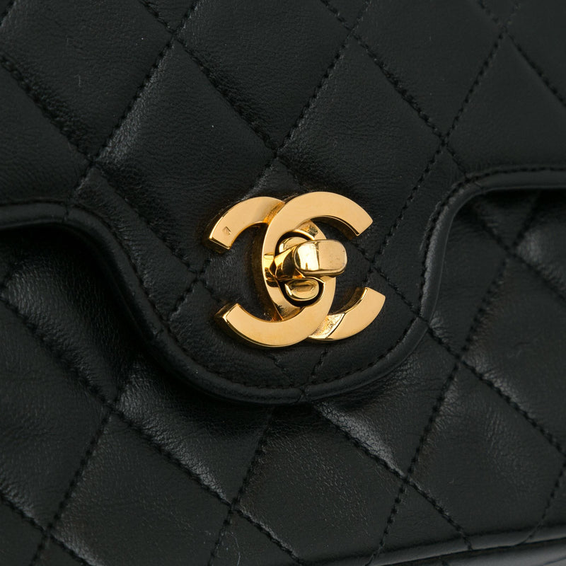 Chanel Small Quilted Double Flap Bag (SHG-L6Ce7A)