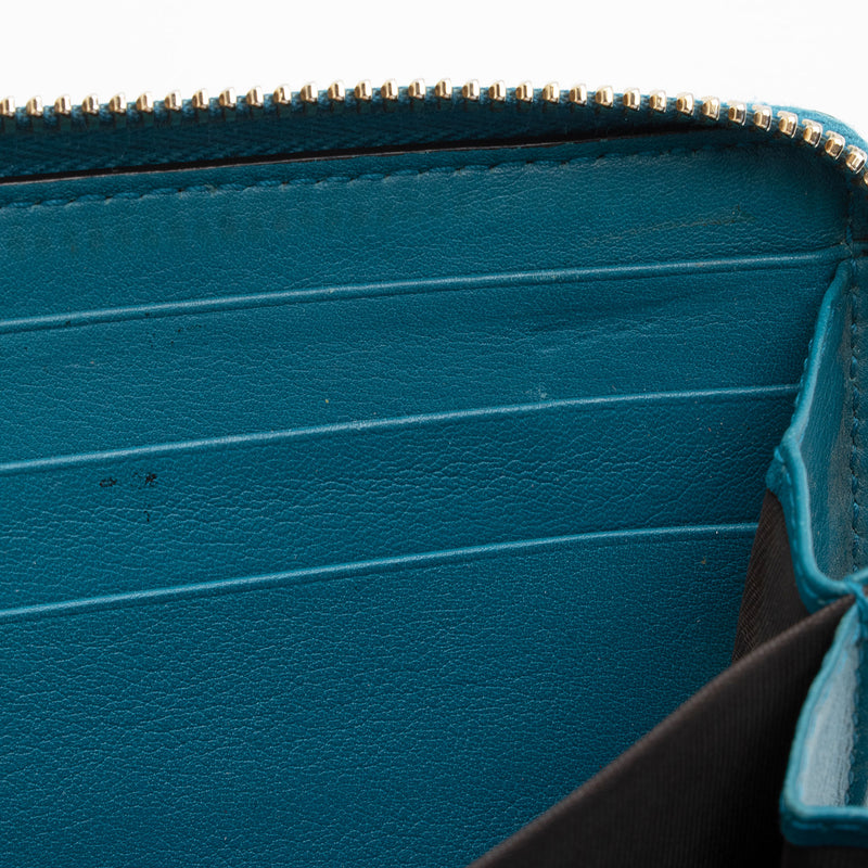 What Goes Around Comes Around Louis Vuitton Blue Empreinte Zippy Wallet
