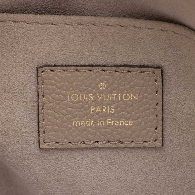 Sold at Auction: Louis Vuitton Giant Monogram Empreinte Madeleine MM Top  Handle Bag