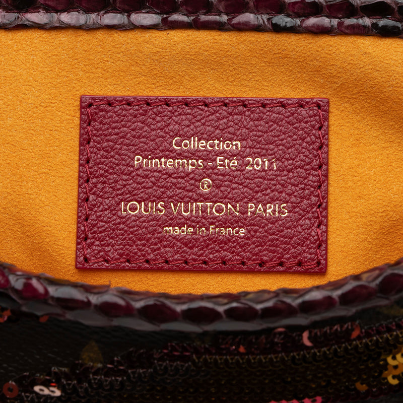 Louis Vuitton Limited Edition Monogram Savage Cub Clutch (SHF-0uOjXs)