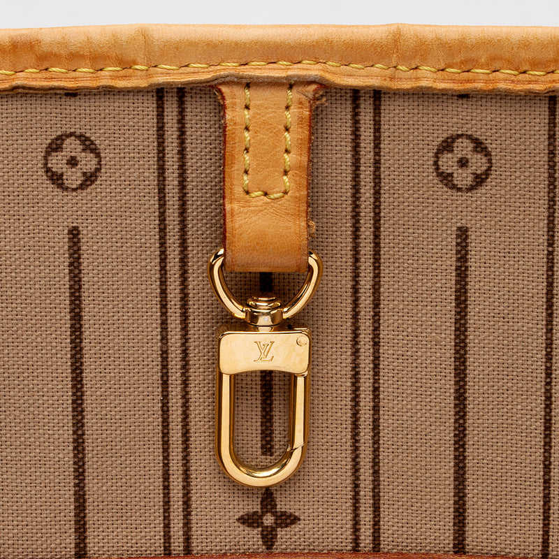 LOUIS VUITTON ELYSEE MONOGRAM WALLET, with gold tone clasp at the