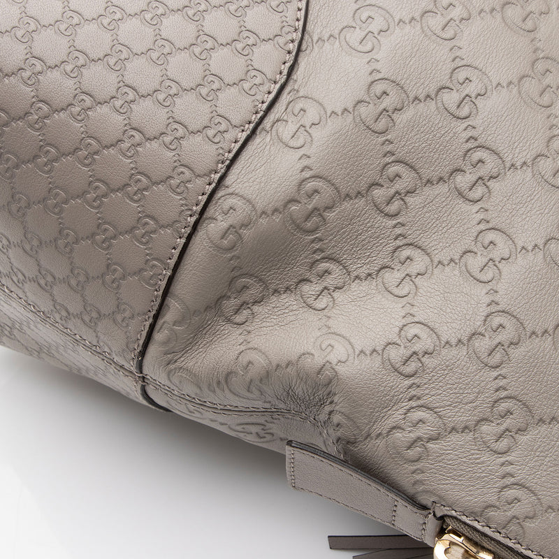 Louis Vuitton Monogram Empreinte Artsy MM (SHG-bHMOhM)