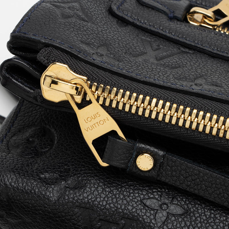 Louis Vuitton Petillante Aurore Monogram Empreinte Leather Clutch