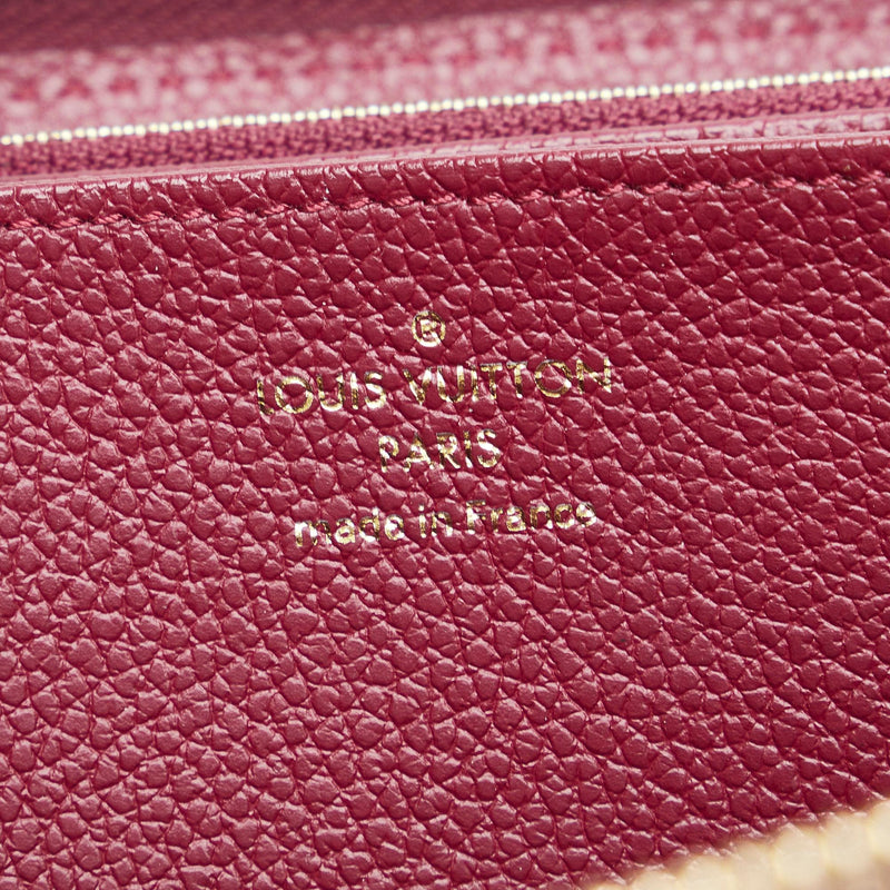 Louis Vuitton Monogram Empreinte Zippy Wallet (SHG-BU7Ag9)