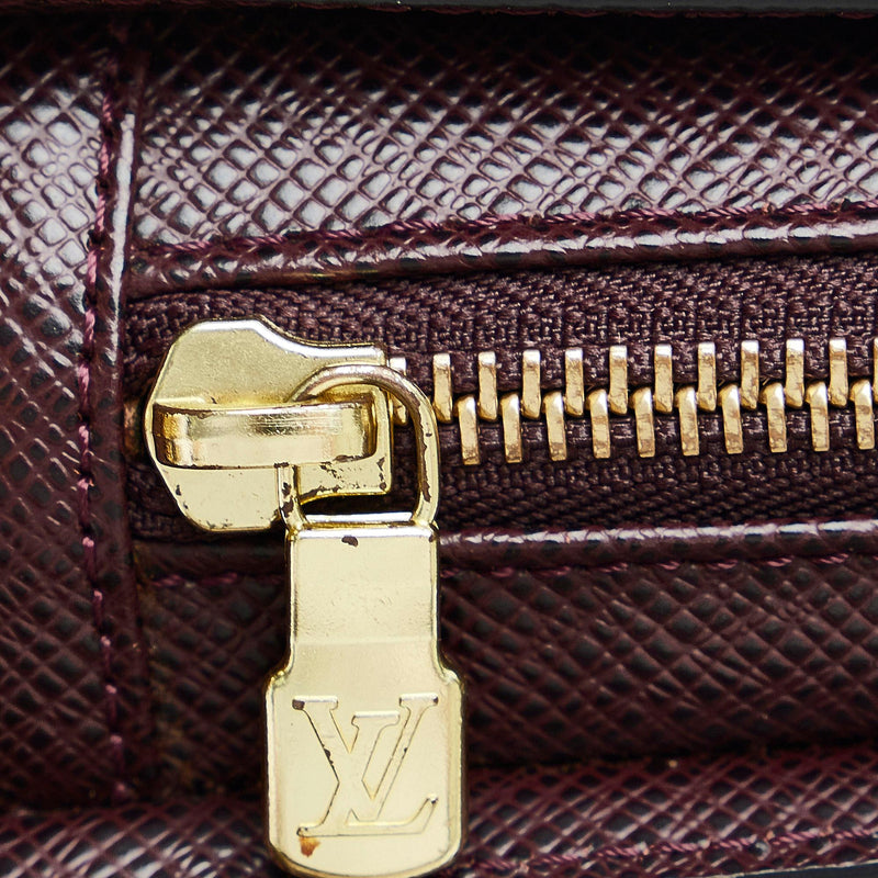 Preowned Authentic Louis Vuitton Taiga Leather Pochette Baikal