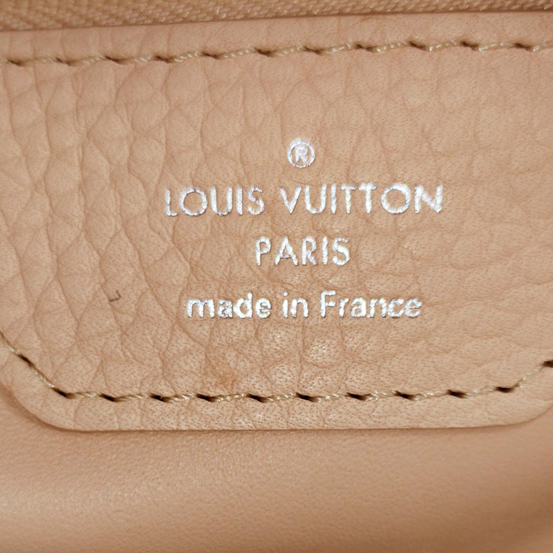 Louis Vuitton Taurillon Capucines MM (SHG-NxXS5i) – LuxeDH