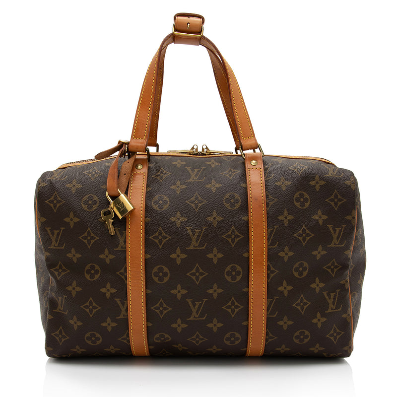 Brown and beige Louis Vuitton Monogram leather duffle bag