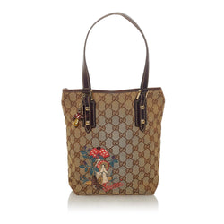 Gucci GG Canvas Handbag  Canvas handbags, Handbag, Reversible leather