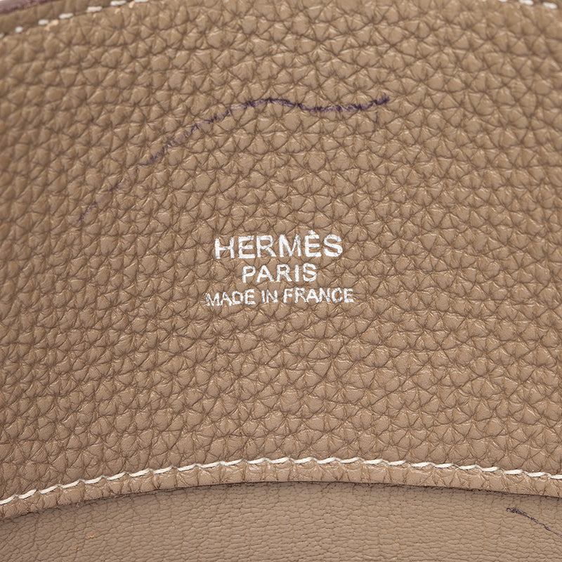 HERMES. Bag in grained leather Togo brown. Model TSAKO. …