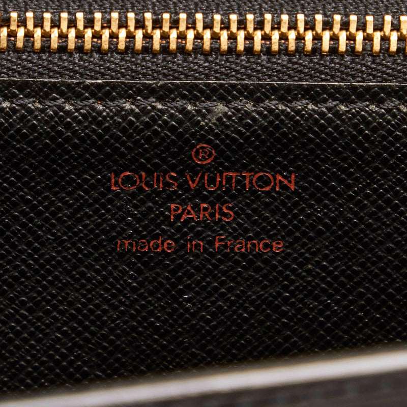 At Auction: Louis Vuitton, LOUIS VUITTON, POCHETTTE SELLIER DRAGONNE