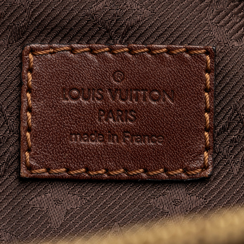 Louis Vuitton Limited Edition Leather Monogram Onatah Pochette