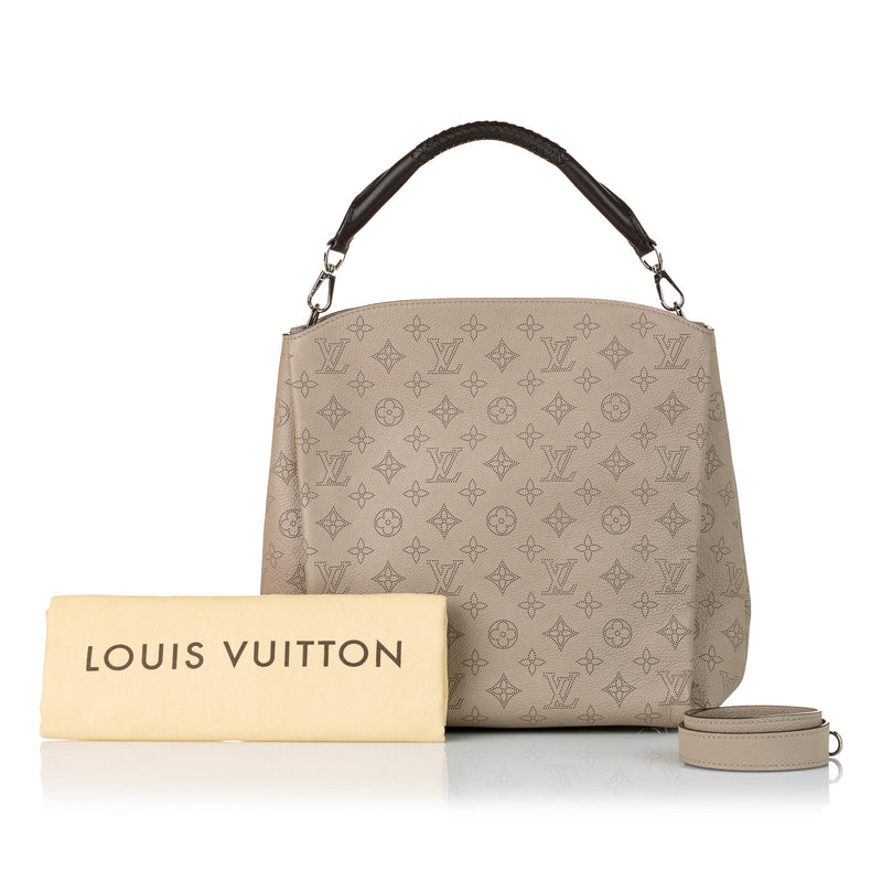 Louis Vuitton Babylone shopping bag in brown monogram canvas and natural  leather