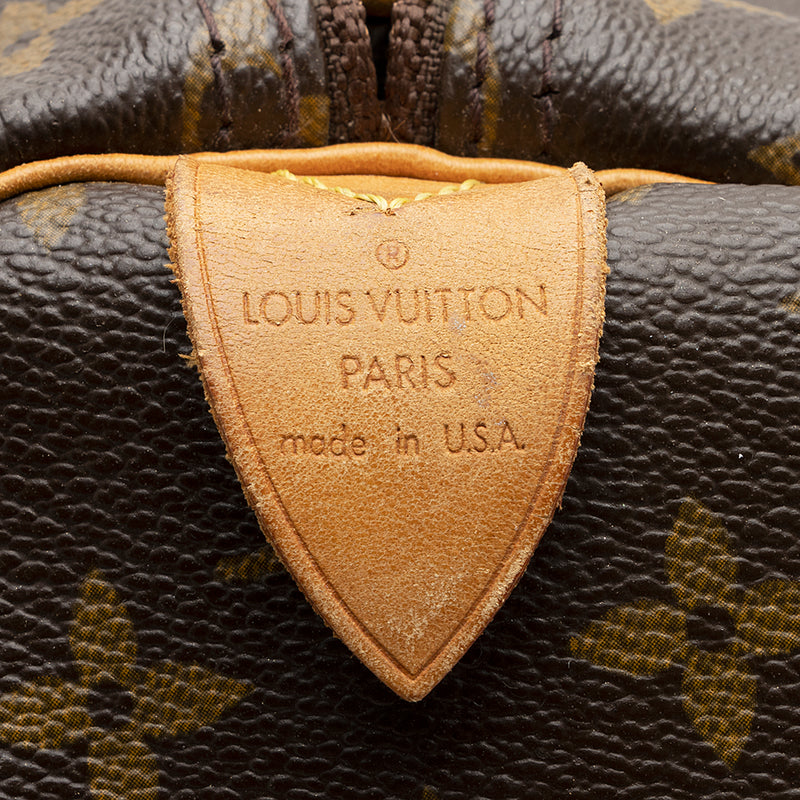 LOUIS VUITTON. Keepall 70 duffel bag in Monogram canvas …