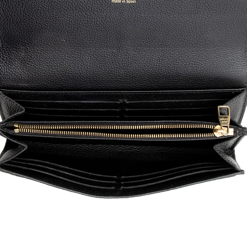 Authentic Louis Vuitton Black Monogram Empreinte Leather Sarah Wallet –  Paris Station Shop
