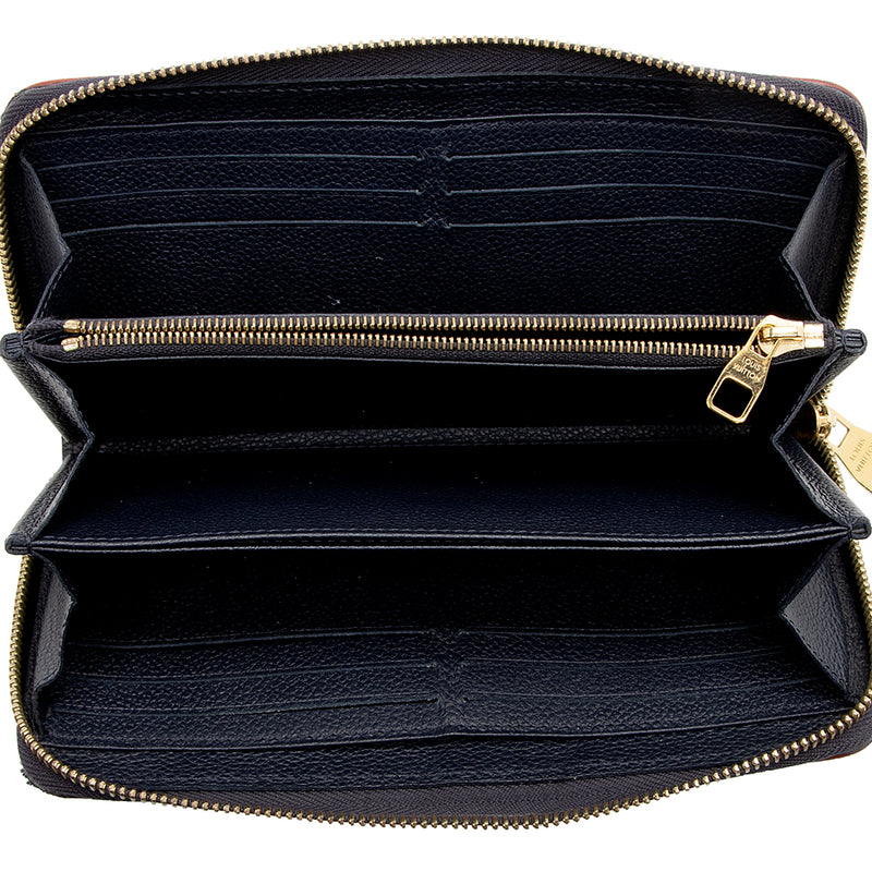 LOUIS VUITTON Monogram Embossed Zippy Wallet, Black – Past & Present  Boutique