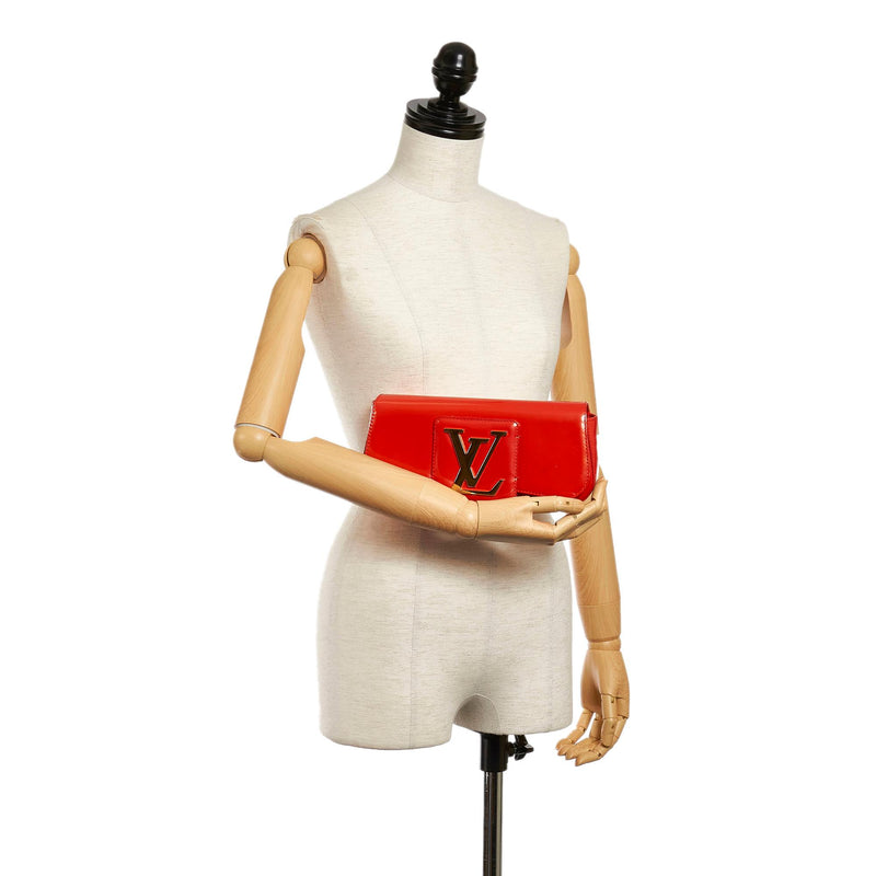 Patent Clutch bag Louis Vuitton, buy pre-owned at 600 EUR