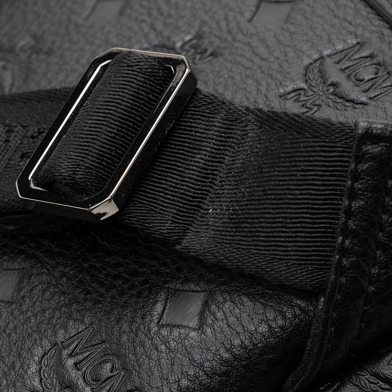 MCM Embossed Leather Small Messenger Bag in Black for Men