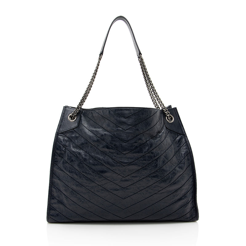 SAINT LAURENT - Monogram quilted-leather shoulder bag | Selfridges.com